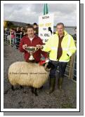 John Nolan, Newport is presented with the John Patten Cup by Irvin Moran (Achill Sheep Show Committee) for Best Ram Lamb (Open) class at the 21st Achill Sheep Show (Taispentas Caorach Acla 2007) at Pattens Bar, Derreens Achill. Photo:  Michael Donnelly