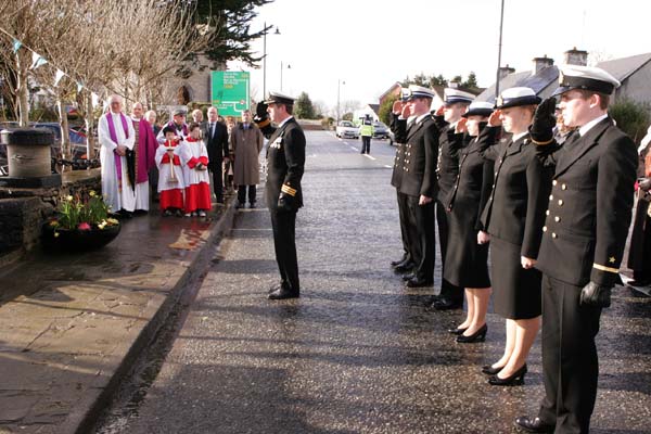 Commander Mark Mellett, Irish Naval Sevice, salutes at the wreath laying ceremony at the commemorations in Foxford Co Mayo Ireland to mark the 150th Anniversary of the death of Admiral William Brown, who was born in Foxford in 1777. Photo Michael Donnelly