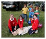 Young members of Claremorris Red Cross Cadets giving a CPR demonstration at the 88th Claremorris Agricultural, from left: Rebeca Cleary, (doing breathing); Dawn Regan, (chest compressions) and   Imelda Clarke, phoning for ambulance; Missing from photo was Evan Stapleton. Photo:  Michael Donnelly