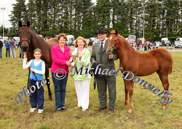 Pauline Prendergast (2nd from left), sponsor, presents the Eileen Prendergast Memorial Cup for Best Colt or Filly Foal to Aine O'Malley, Ballinrobe, included in photo are Grainne and Billy O'Malley.Photo: Michael Donnelly.