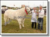 Robert Burns, Easkey, Co Sligo is presented with the Martin Waldron Memorial  Cup for Commercial Cattle Champion of Show by Joe Hallinan, Quin Co Clare (judge) at Claremorris Agricultural Show.Photo: Michael Donnelly.