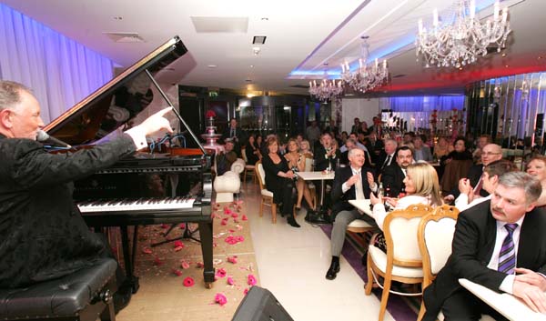 Composer, songwriter and pianist Phil Coulter  finishes off a song to the applause of the invited audience at the official opening of Days Hotel "The Harlequin", Castlebar. Photo:  Michael Donnelly
