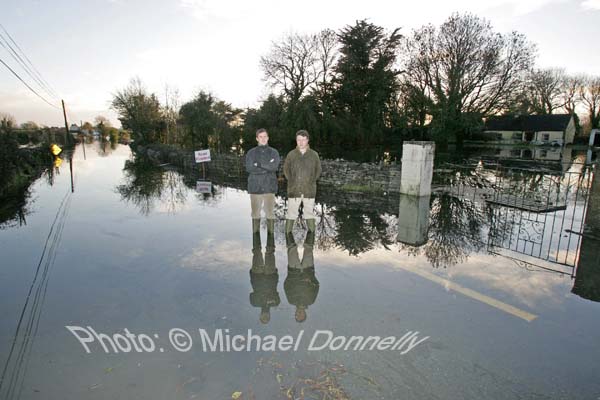 Paul Costello of OPW and Councillor Damien Ryan at the severe flooding on The Neale Road, Ballinrobe. Photo:  Michael Donnelly