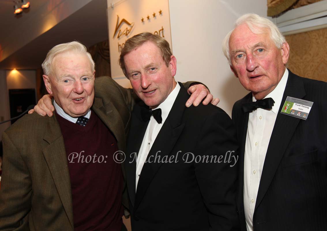 Mick Mulderrig who won an All Ireland Senior Football medal for Mayo 1951 pictured  with Taoiseach Enda Kenny TD and Frank Fleming Mayo Association Dublin at the Mayo Associations Worldwide Convention 2011 Gala dinner in Hotel Westport. Photo: © Michael Donnelly 2011