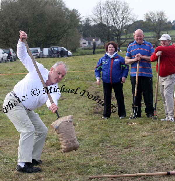 Tommy Farragher, Corofin Tuam takes a good swing at the Sheaf Throwing at the 2009 Mayo County Ploughing Championships at Claremorris. Photo:  Michael Donnelly