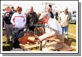 Terry Maughan, Ballyhaunis puts the finishing touches to a copper bucket at the 2009 Mayo County Ploughing Championships at Claremorris. Photo:  Michael Donnelly