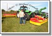 Gerry and Patrick Rabbitte of Gerry Rabbitte Agri Sales pictured with a machine that would make quick work of a few acres of Grass at the 2009 Mayo County Ploughing Championships at Claremorris. Photo:  Michael Donnelly