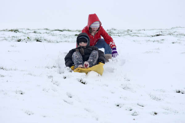 Children in Ballyheane enjoying a slide after the snow fall on Friday last. Photo:  Michael Donnelly