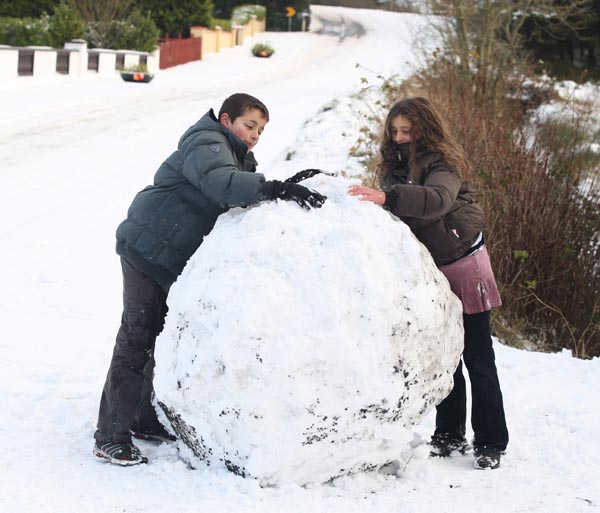 Jonathan and Jessica with their Monster Snowball. Photo:  Michael Donnelly
