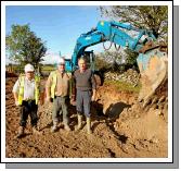 Gerard McGough and Mick Butler pictured with Sean Joyce Kilmaine (who has fought a campaign for many years to get a solution to the local flooding) as the last few pipes are backfilled to relieve the winter flooding from the Thomastown Turlough Kilmaine. Photo:  Michael Donnelly