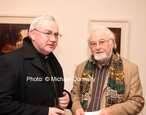 Fr John Durkan, Kiltimagh  pictured with Michael Mullen Castlebar at the official opening of "Discovered Moments" an exhibition of recents works by Deirdre Walsh in the Linenhall Arts Centre Castlebar. The official opening was performed by  Michael and continues until 1st November. Photo:  Michael Donnelly
