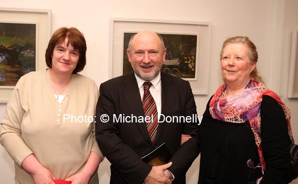 Pictured at the official opening of "Discovered Moments" an exhibition of recents works by Deirdre Walsh in the Linenhall Arts Centre Castlebar, from left: Nora Mandel, Cllr Michael Kilcoyne and Bonnie Connolly. The official opening was performed by Castlebar Author Michael Mullen. Photo:  Michael Donnelly