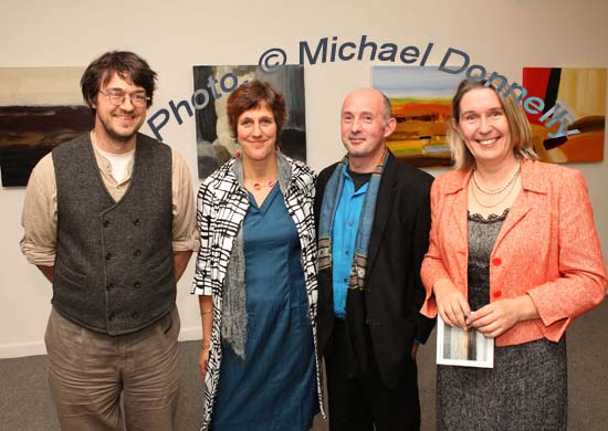 Pictured at the official opening of "Intimate Ground", an exhibition of atmospheric paintings by artist Stephen Rinn, in the Linenhall Arts Centre Castlebar, from left: John Mulloy, Westport, who performed the official opening; Lucy Sutton, Stephen Rinn, Artist and Marie Farrell, Director Linenhall Arts Centre Castlebar. Photo:  Michael Donnelly
