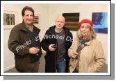Pictured at the official opening of "Intimate Ground" an exhibition of atmospheric paintings by artist Stephen Rinn, in the Linenhall Arts Centre Castlebar, from left: Dermot Seymour Partry; Ned McLoughlin Inchicore, Dublin and Audrey Carr Westport. Photo:  Michael Donnelly .

