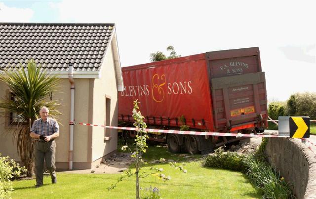 Pat Staunton, Ballyheane, had a narrow escape when the truck crashed through his garden.