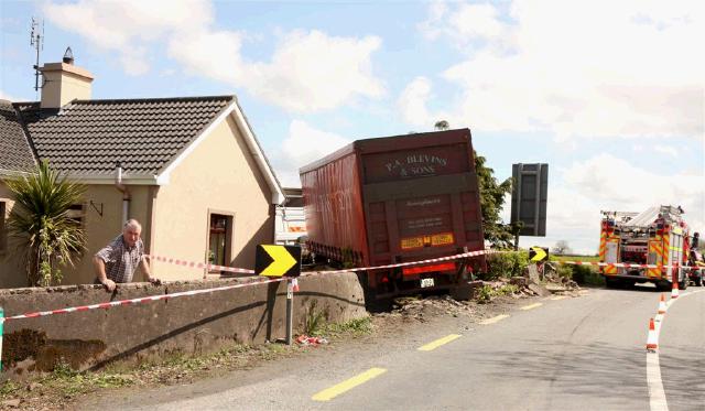 Pat Staunton, had a narrow escape when this truck crashed through his wall at Ballyheane just missing his house.