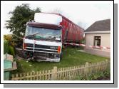 The truck crashed through a wall in Ballyheane and ended up in a fishpond after the driver took ill.