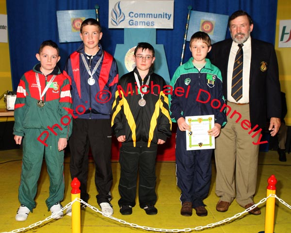 Joseph Murhy, Kilmaine won the U-14 art competition at the HSE Community Games National Finals in Mosney pictured at the prizegiving ceremony, front from left:  Joseph Murphy, Mayo 1st; Cian Hyland, Monaghan, 2nd; Daniel Gallagher, 3rd; and Mulvihill, certificate; included in photo is Seamus Lawlor, Community Games.