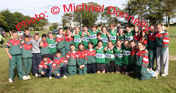 Group pictured in Mosney after Castlebar  U-15 Girls Rounders team won Gold in the final at the HSE Community Games National Finals in Mosney, also in photo are the U-13 team and some young supporters. Photo:  Michael Donnelly