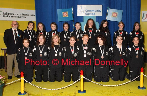 St Feichins U-16 Choir Sligo got Bronze, pictured at the HSE Community Games National Finals in Mosney prizegiving ceremony front from left: Elaine O'Connell, Aisling McGetterick, Aoife Anderson, Fiona McGoldrick, Rachel Cavanagh, Megan Jinks, Emma Cavanagh and Cora Brown
at back: Conal Duffy, HSE Community Games Director; Lauren Taheny, Eimear Dillon, Hannah Nicholson, Saoirse Geraghty, Carina Anderson,  Niamh Burke, Lauren Elliott, Avril Burke, and Michelle Leyden. Photo:  Michael Donnelly