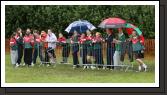 Watching the Castlebar Girls rounders during the damp weather on Saturday at the HSE Community Games National Finals in Mosney. Photo:  Michael Donnelly