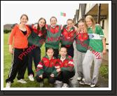 Castlebar rounders wait due to rain, front from left: Tanya Flynn, Katie Glynn, at back: Danielle McGowan, Leighann Grier, Nicole Williams,  Katie Lane,  Lycia Heneghan, and Ilona Melnychuk at the HSE Community Games National Finals in Mosney. Photo:  Michael Donnelly