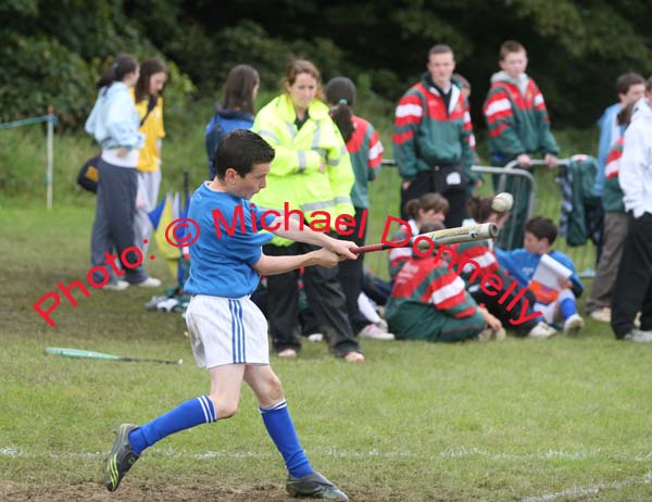 Killian Dervan connects with the Sliothar for the Breaffy U-13 Rounders team, at the HSE Community Games National Finals in Mosney, Photo:  Michael Donnelly