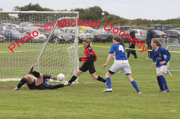  Balla Soccer girls put pressure on Fanad Co Donegal at the HSE Community Games National Finals in Mosney, Photo:  Michael Donnelly