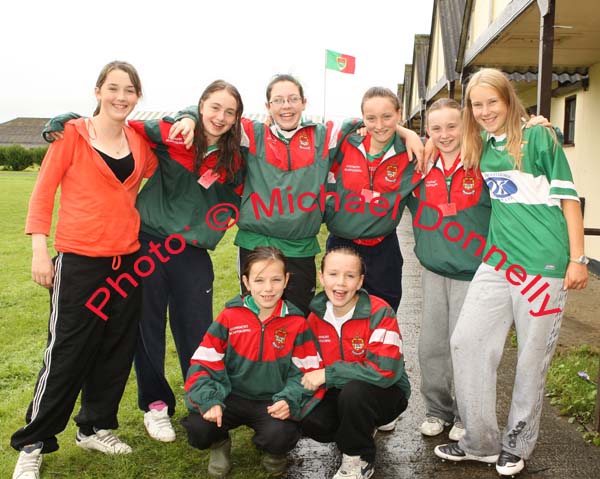 Castlebar rounders wait due to rain, front from left: Tanya Flynn, Katie Glynn, at back: Danielle McGowan, Leighann Grier, Nicole Williams,  Katie Lane,  Lycia Heneghan, and Ilona Melnychuk at the HSE Community Games National Finals in Mosney. Photo:  Michael Donnelly