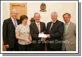 Fianna Fail General Election candidate for Mayo, Deputy John Carty, T.D., (centre) hands in his nomination paper to Returning Officer Fintan Murphy, in the Court House Castlebar, included in photo from left: Denis Gallagher, Director of Elections; Marie Quinn, Assistant Returning Officer; and Aidan Crowley, Election Agent. Photo:  Michael Donnelly