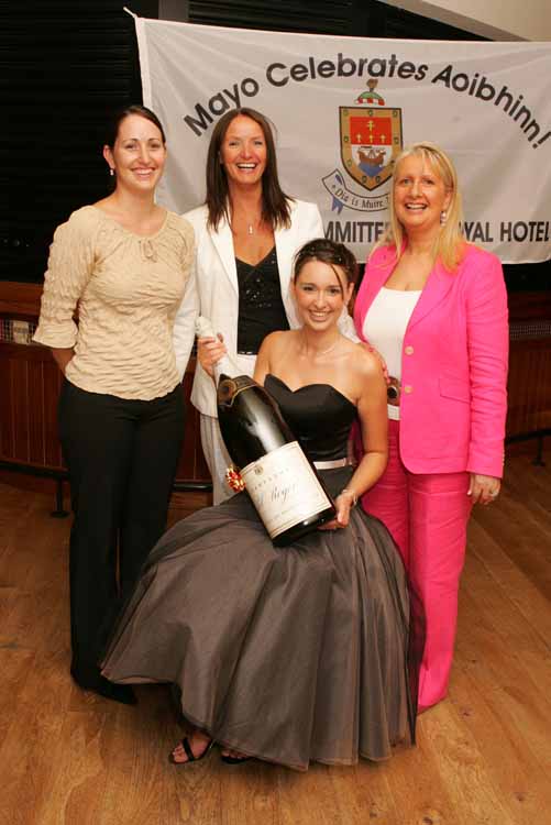 Mayo Rose of Tralee Aoibhinn N Shilleabhin pictured at the farewell reception for her in the TF Royal Hotel and Theatre, Castleba gets ready to celebrate with a Magnum of Champagne included in photo are Bryana Hindle, TF Royal Theatre, Marita Staunton former Rose of Tralee and Mary Jennings chairperson Mayo Rose of Tralee Committee. Photo: Michael Donnelly.
