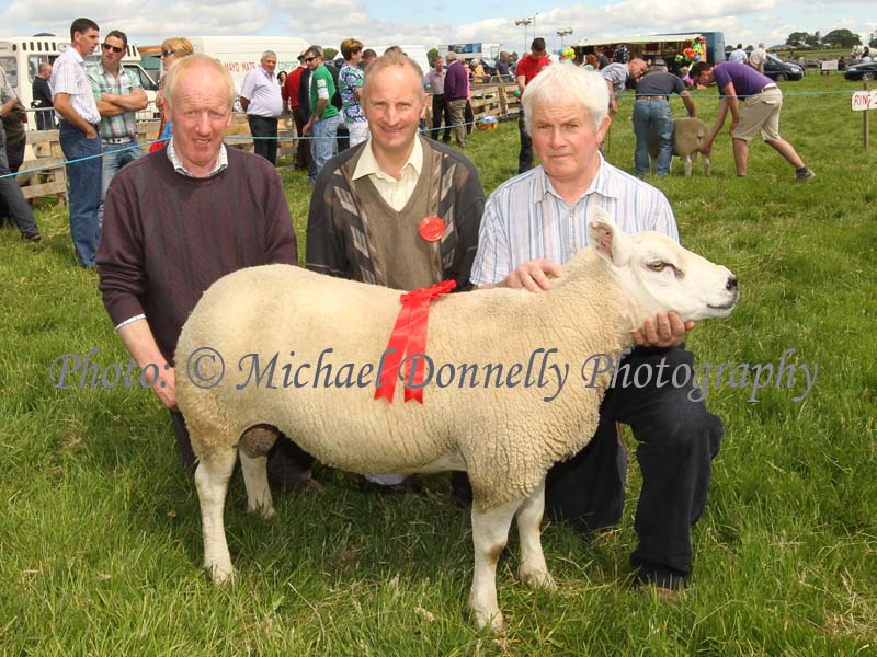 Paul Coyne, Kilmaine, (on right) with his prizewinning Pedigree Texel Shearling Ram or upwards at Roundfort Agricultural Show  pictured with Noel Costello, Committee, and Tom Waldron, Tuam (Judge). Photo: © Michael Donnelly Photography