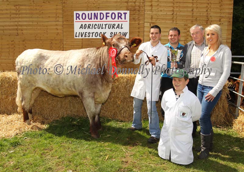 Kieran, Christopher, and (at front) Adrian  Flatley, Kilkelly are presented with the Kieran McAllister Cup by Kieran McAllister, Aclare Co Sligo for Champion Shorthorn at the Roundfort Agricultural Show included in photo is Imelda Middleton, (Judge) Tourmakeady and Westmeath. Photo: © Michael Donnelly Photography