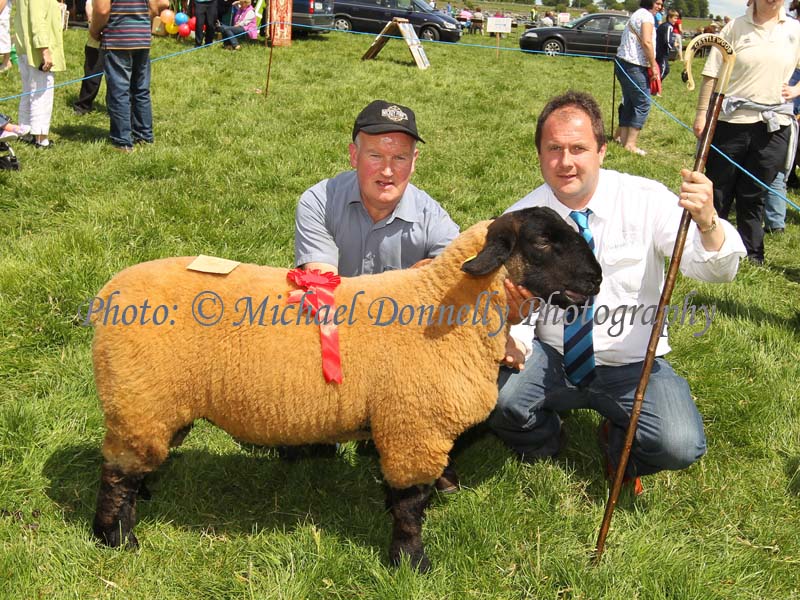 James Rooney, (Benwisken Suffolks), Grange Co Sligo, gets 1st prize in the West of Ireland Registered Pedigree Suffolk Sheepbreeders Club Ram Lamb Class at Roundfort Agricultural Show  pictured with Martin Butler, Judge Co Meath.Photo: © Michael Donnelly Photography