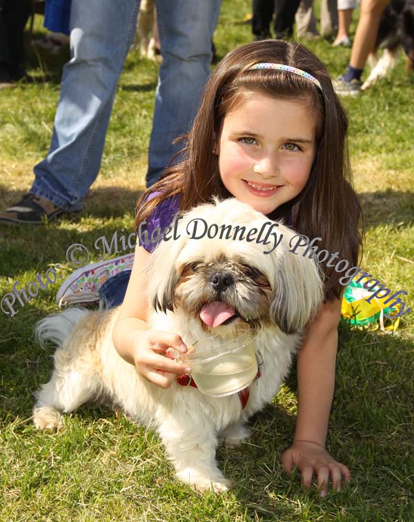Orlaigh Maloney, Hollymount offers a drink to her  Dog " Jake"  on a hot Summers Day at the Dog Show at Roundfort Agricultural Show. Photo: © Michael Donnelly Photography
