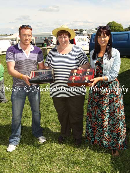 Frank Garvey, Carrick on Shannon and Deirdre Cunningham, Taugheen, Claremorris are presented with their prizes for "Most Appropriately Dressed Gentleman and Lady" at Roundfort Agricultural Show by Geraldine Varley (committee). Photo:Michael Donnelly