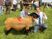 James Rooney, Grange Co Sligo pictured  with his prizewinning aged Ewe in the West of Ireland Registered Pedigree Suffolk Sheepbreeders Club Class at Roundfort Agricultural Show with Martin Butler, Judge, Co Meath. Photo: © Michael Donnelly Photography