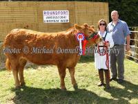 Ann Marie Clarke, Knockmore with her Champion Limousin of Show and Gerry Walsh
 at Roundfort Agricultural Show. Photo: © Michael Donnelly Photography