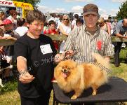 Sandra Mullarkey, Tubbercurry Co Sligo pictured with "Lucky" her "Toy Class" winning Pomeranian at Roundfort Agricultural Show 2012, included in photo is Kevin Hannon, Sligo (Judge) . Photo: © Michael Donnelly Photography