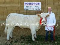 Noel Colgan, Clooneen, Bohola pictured at Roundfort Agricultural Show  with his prizewinning Pedigree Charolais Heifer any age. Photo: © Michael Donnelly Photography