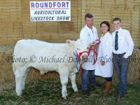 Ronan, Sandra and Michael Carey of Sion Hill, Killucan, Co Westmeath pictured with their prizewinning Pedigree Charolais male Calf born 2012, Reserve Champion Charolais at Roundfort Agricultural Show (Co Mayo) 2012. Photo: © Michael Donnelly Photography