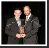 Cathal Freeman, Tooreen and Mayo Hurling star is presented with his trophy by Guest of Honour Paul McGrath at the Western People Mayo Sports Awards 2006 presentation in the TF Royal Theatre Castlebar. Photo:  Michael Donnelly