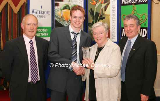 Caoln Flanagan Ballymena /Antrim AC is presented with his award at the Waterford Crystal A.A.I, Juvenile Star Awards in the Belmont Hotel, Knock Co Mayo by  Breda Synott chairperson National Juvenile Committee AAI, included in photo are Michael Gaffney Waterford Crystal (sponsors), and  Patsy McGonagle Vice-president AAI and Photo Michael Donnelly