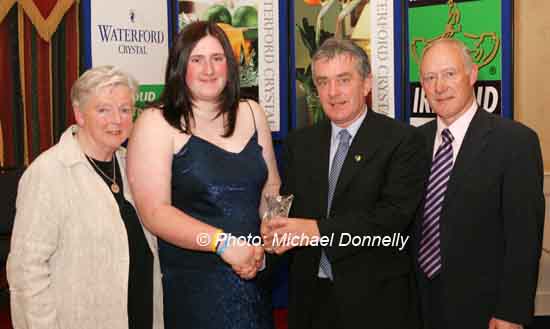 Rhiannon McNally Craigavon AC  (Armagh) is presented with her award at the Waterford Crystal A.A.I,  Juvenile Star Awards in the Belmont Hotel, Knock by  Patsy McGonagle Vice-president AAI included in photo are Michael Gaffney, Waterford Crystal (sponsor), and Breda Synott chairperson National Juvenile Committee AAI, Photo Michael Donnelly