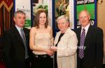 Gemma Hynes Galway City Harriers AC is presented with her award at the Waterford Crystal A.A.I,  Juvenile Star Awards in the Belmont Hotel, Knock Co Mayo by  Breda Synott chairperson National Juvenile Committee AAI, included in photo are Patsy McGonagle Vice-president AAI and Michael Gaffney Waterford Crystal (sponsors). Photo Michael Donnelly

