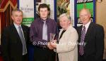 James Nagle, Castlemaine (Farranfore Maine Club) is presented with his award at the Waterford Crystal A.A.I, Juvenile Star Awards in the Belmont Hotel, Knock by  Breda Synott chairperson National Juvenile Committee AAI, included in photo are Patsy McGonagle Vice-president AAI and Michael Gaffney, Waterford Crystal (sponsor). Photo Michael Donnelly