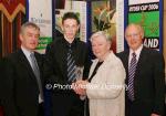 Barry Pender St Abbans AC is presented with his award at the Waterford Crystal A.A.I,  Juvenile Star Awards in the Belmont Hotel, Knock Co Mayo by  Breda Synott chairperson National Juvenile Committee AAI, included in photo are Patsy McGonagle Vice-president AAI and Michael Gaffney Waterford Crystal (sponsors). Photo Michael Donnelly

