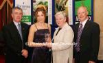 Louise Nicholson Emerald AC Limerick is presented with her award at the Waterford Crystal A.A.I,  Juvenile Star Awards in the Belmont Hotel, Knock Co Mayo by by  Breda Synott chairperson National Juvenile Committee AAI, included in photo are Patsy McGonagle Vice-president AAI and Michael Gaffney Waterford Crystal (sponsors). Photo Michael Donnelly