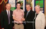 Thomas McBride  Drumcliff  North Sligo AC is presented with his award at the Waterford Crystal A.A.I,  Juvenile Star Awards in the Belmont Hotel, Knock by  Patsy McGonagle Vice-president AAI included in photo are Michael Gaffney, Waterford Crystal (sponsor), and Breda Synott chairperson National Juvenile Committee AAI, Photo Michael Donnelly