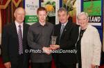 Aaron Crawford, Strabane Track Club is presented with his award at the Waterford Crystal A.A.I,  Juvenile Star Awards in the Belmont Hotel, Knock Co Mayo  by  Patsy McGonagle Vice-president AAI included in photo are Michael Gaffney, Waterford Crystal (sponsor), and Breda Synott chairperson National Juvenile Committee AAI, Photo Michael Donnelly

